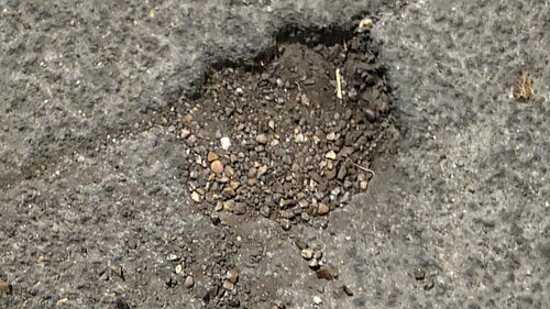 Pothole in Lyminge Way